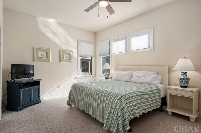 bedroom featuring carpet flooring and a ceiling fan