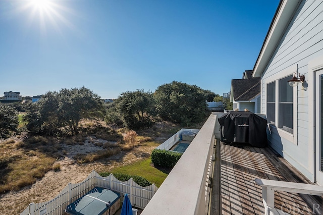 balcony featuring area for grilling