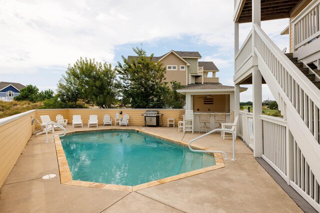 670 Hunt Club Dr Lot 194, Corolla, NC 27927 - view of swimming pool with a patio area and stairway
