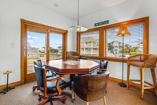 670 Hunt Club Dr Lot 194, Corolla, NC 27927 - dining space with carpet flooring, baseboards, and healthy amount of natural light