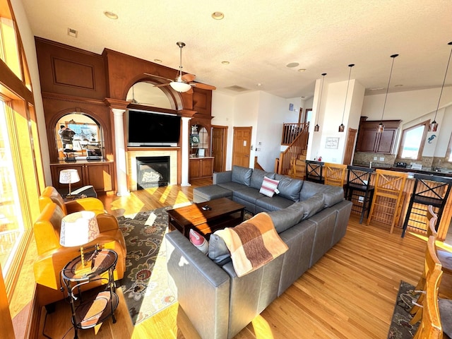 670 Hunt Club Dr Lot 194, Corolla, NC 27927 - living room with light wood-style flooring, stairs, a fireplace, and recessed lighting
