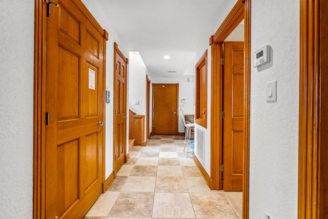 670 Hunt Club Dr Lot 194, Corolla, NC 27927 - hallway featuring a textured wall and recessed lighting
