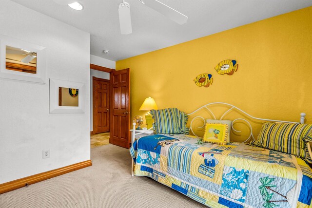 670 Hunt Club Dr Lot 194, Corolla, NC 27927 - carpeted bedroom featuring baseboards and a ceiling fan