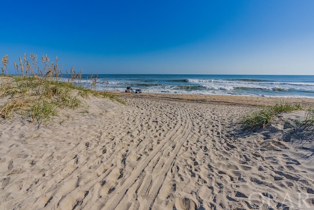 property view of water with a beach view