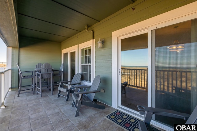 balcony featuring a sunroom