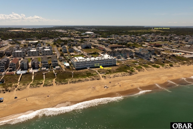 bird's eye view with a beach view and a water view