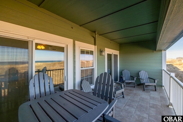 balcony featuring outdoor dining area