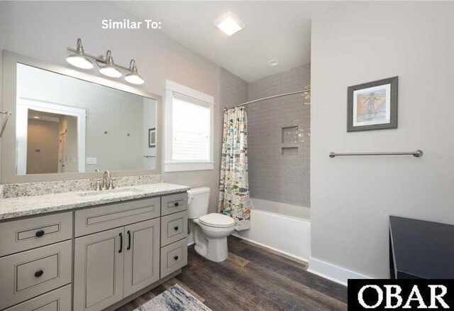 914 Sea Ridge Dr Lot 62, Corolla, NC 27927 - bathroom featuring wood finished floors, vanity, and shower / tub combo with curtain