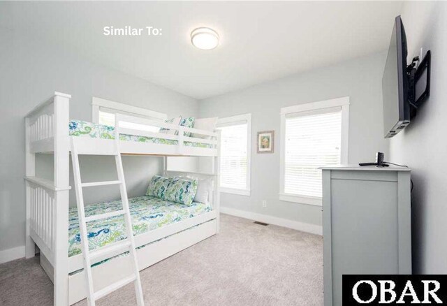 914 Sea Ridge Dr Lot 62, Corolla, NC 27927 - carpeted bedroom featuring baseboards
