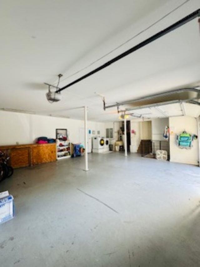 290 Hillcrest Dr Lot 22, Southern Shores, NC 27949 - garage featuring a garage door opener