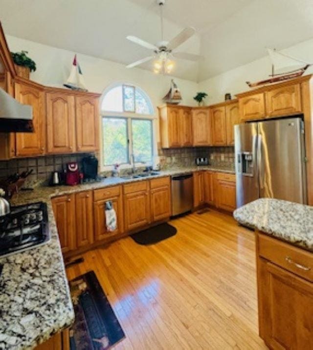 290 Hillcrest Dr Lot 22, Southern Shores, NC 27949 - kitchen with tasteful backsplash, ceiling fan, light wood-type flooring, and stainless steel appliances