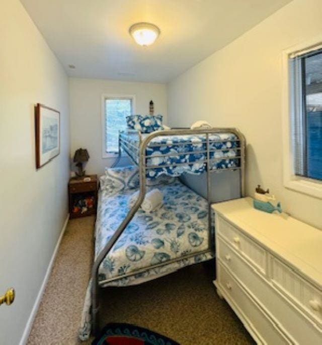 290 Hillcrest Dr Lot 22, Southern Shores, NC 27949 - bedroom with dark colored carpet and baseboards