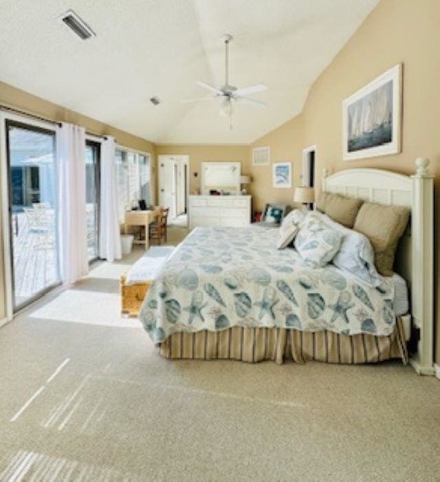 290 Hillcrest Dr Lot 22, Southern Shores, NC 27949 - bedroom featuring access to outside, vaulted ceiling, visible vents, ceiling fan, and carpet