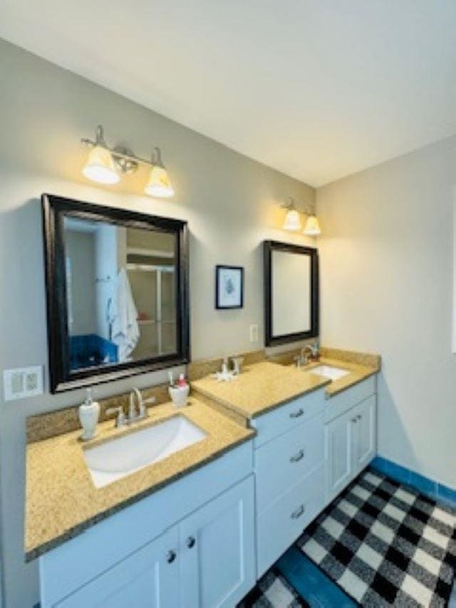 290 Hillcrest Dr Lot 22, Southern Shores, NC 27949 - full bath featuring a shower, double vanity, and a sink