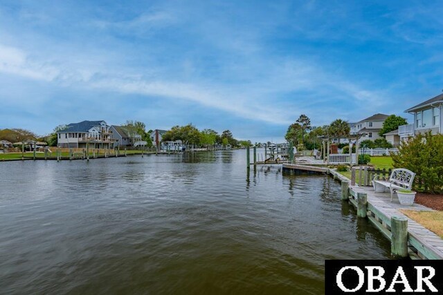 4025 Ivy Ln Lot 11, Kitty Hawk, NC 27949 - dock area featuring a water view and a residential view