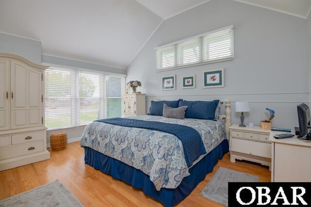 4025 Ivy Ln Lot 11, Kitty Hawk, NC 27949 - bedroom featuring light wood finished floors and vaulted ceiling