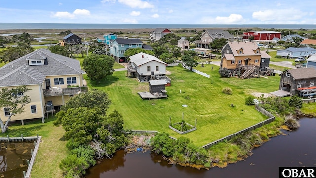 57194 M V Australia Ln, Hatteras, NC 27943 - aerial perspective of suburban area with a large body of water