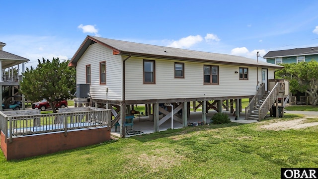 57194 M V Australia Ln, Hatteras, NC 27943 - rear view of house with stairway and a lawn