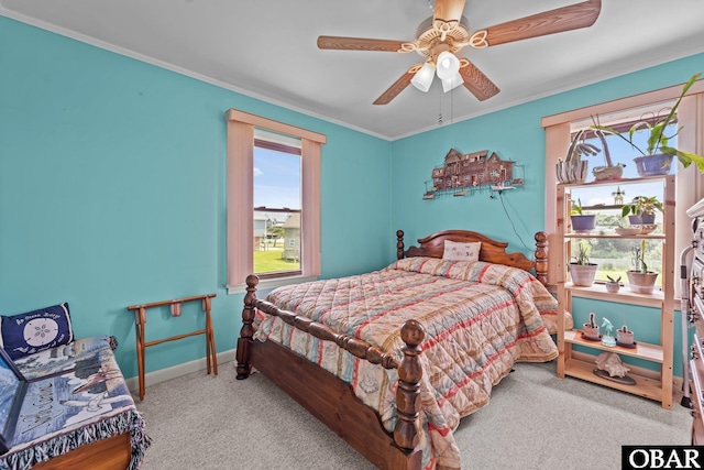 57194 M V Australia Ln, Hatteras, NC 27943 - bedroom with carpet, ornamental molding, baseboards, and a ceiling fan