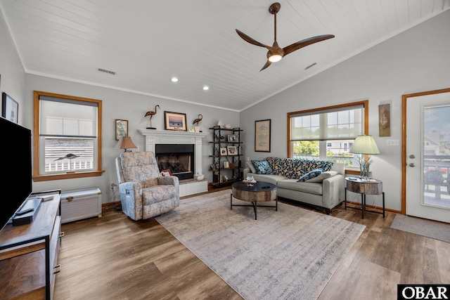 305 W Fourth St Lot 7, Kill Devil Hills, NC 27948 - living room with wood finished floors, ceiling fan, a fireplace with raised hearth, wooden ceiling, and recessed lighting