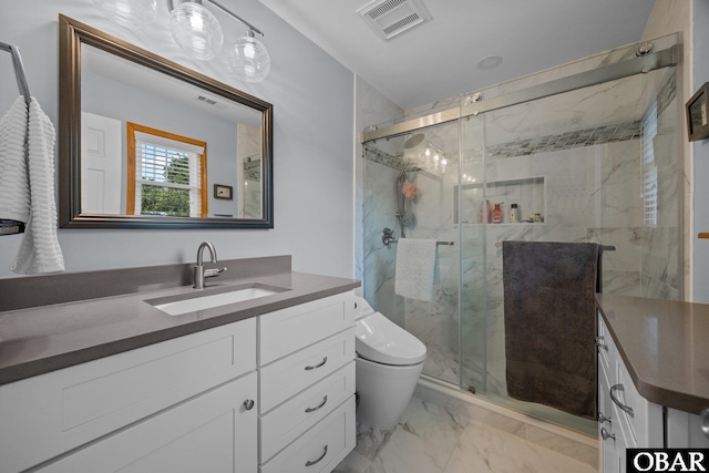 305 W Fourth St Lot 7, Kill Devil Hills, NC 27948 - bathroom featuring marble finish flooring, vanity, and a marble finish shower