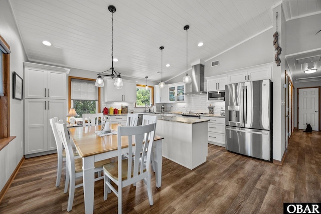 305 W Fourth St Lot 7, Kill Devil Hills, NC 27948 - dining room with lofted ceiling, dark wood-style flooring, recessed lighting, and wooden ceiling
