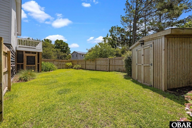 305 W Fourth St Lot 7, Kill Devil Hills, NC 27948 - fenced backyard with a storage shed