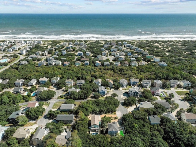 bird's eye view with a water view and a residential view