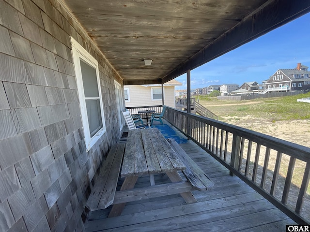 3737 Hallett St Lot # 100, Kitty Hawk, NC 27949 - deck featuring outdoor dining area and a residential view