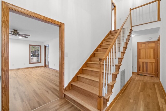 136 Daphne Ln Lot 15, Manteo, NC 27954 - stairs featuring wood finished floors, ceiling fan, and baseboards