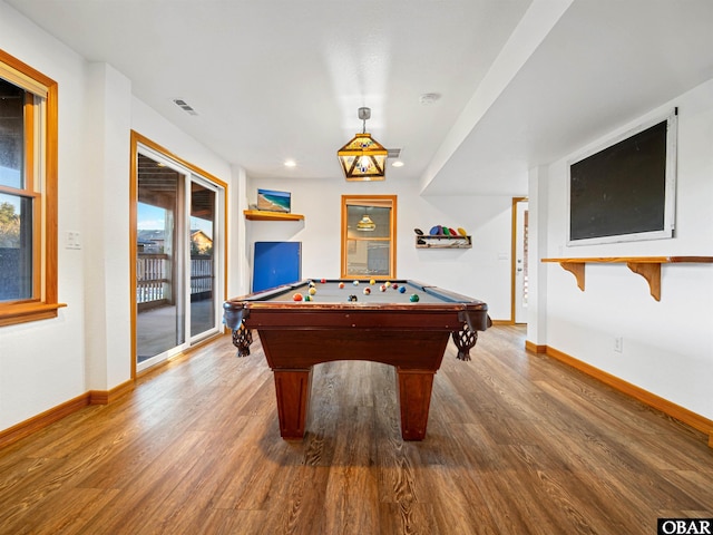 game room with visible vents, baseboards, and wood finished floors