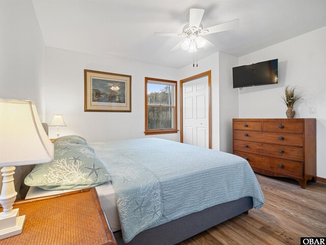 2203 Pike Rd Lot 37, Corolla, NC 27927 - bedroom featuring wood finished floors, ceiling fan, and baseboards