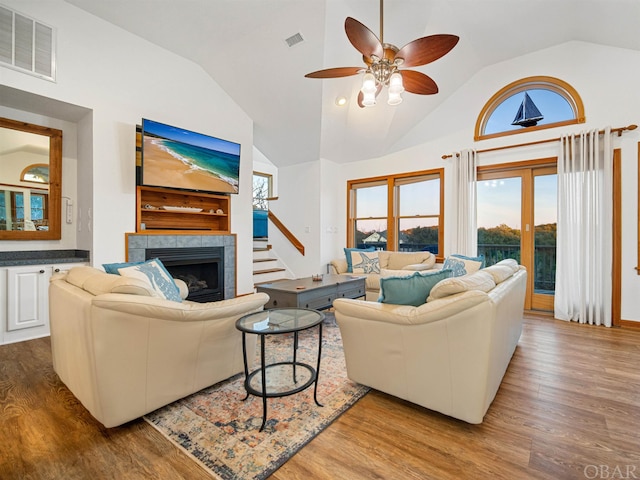 living room with visible vents and wood finished floors