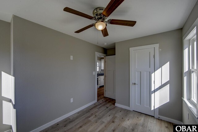 27250 Sand St Lot # 7, Salvo, NC 27972 - spare room with wood finished floors, baseboards, and ceiling fan