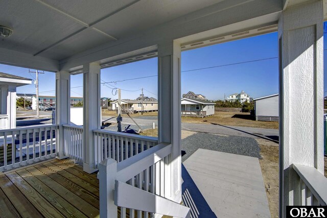 27250 Sand St Lot # 7, Salvo, NC 27972 - sunroom with a residential view