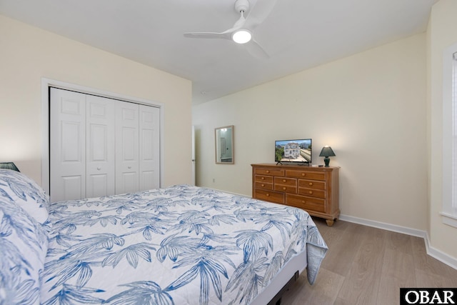 25245 Island Pines Dr Lot 6, Waves, NC 27982 - bedroom featuring light wood finished floors, a closet, baseboards, and ceiling fan