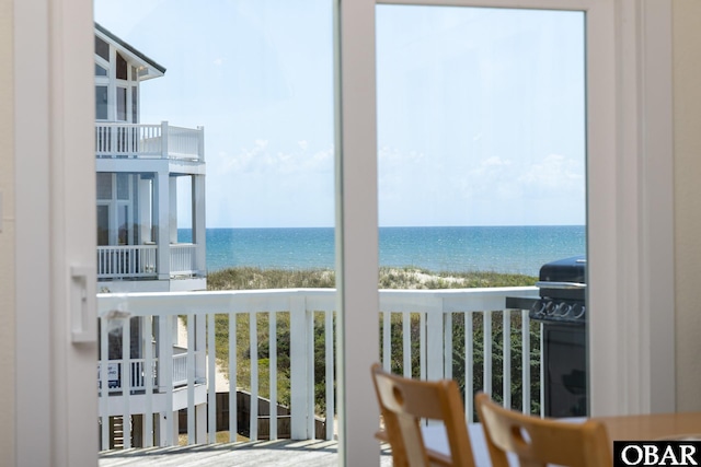 25245 Island Pines Dr Lot 6, Waves, NC 27982 - balcony featuring a water view and grilling area
