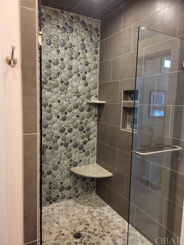 full bathroom with a walk in shower