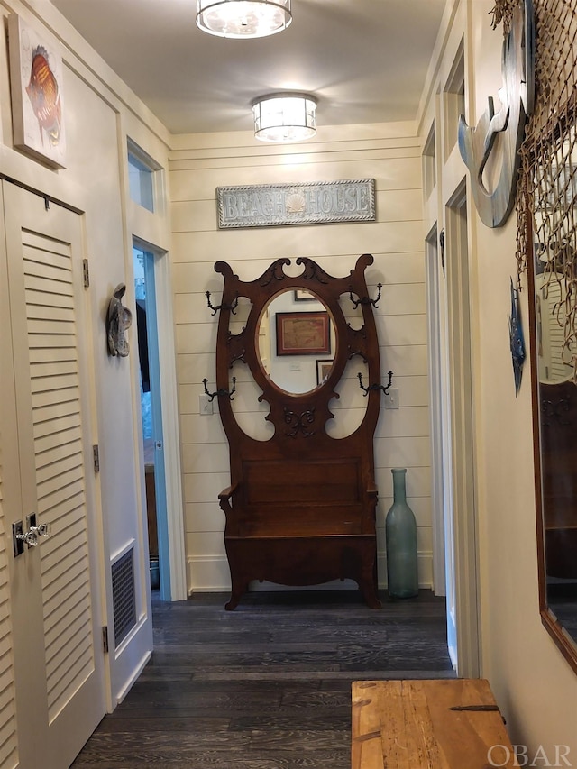 mudroom featuring dark wood-style flooring and visible vents