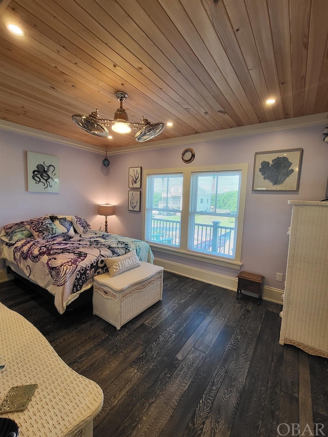 bedroom featuring baseboards, dark wood-style floors, wood ceiling, crown molding, and recessed lighting