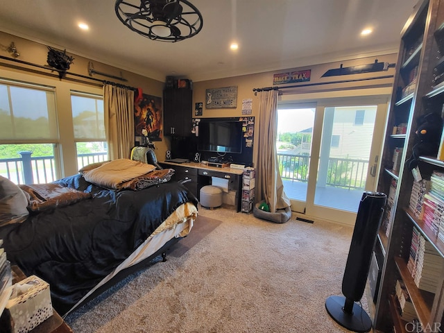 carpeted bedroom featuring access to outside and recessed lighting