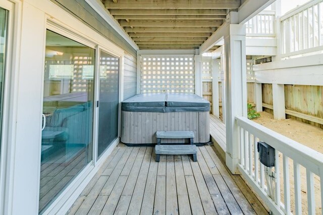 balcony with a hot tub