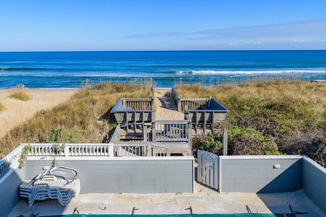 aerial view featuring a beach view and a water view