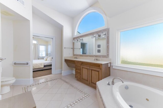 full bath featuring baseboards, ensuite bathroom, visible vents, and tile patterned floors