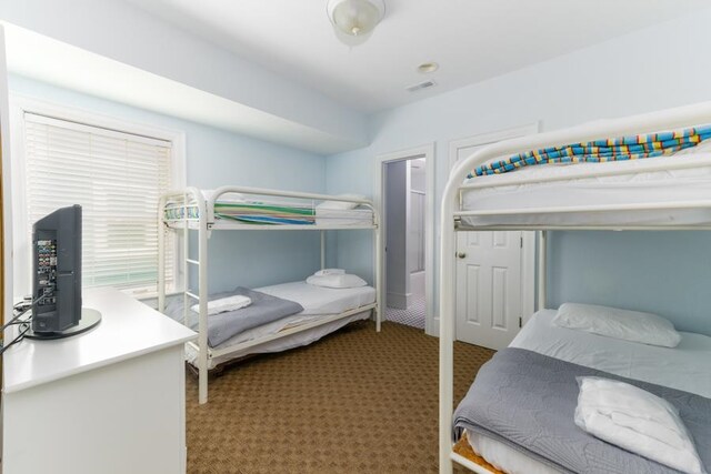 bedroom featuring carpet flooring