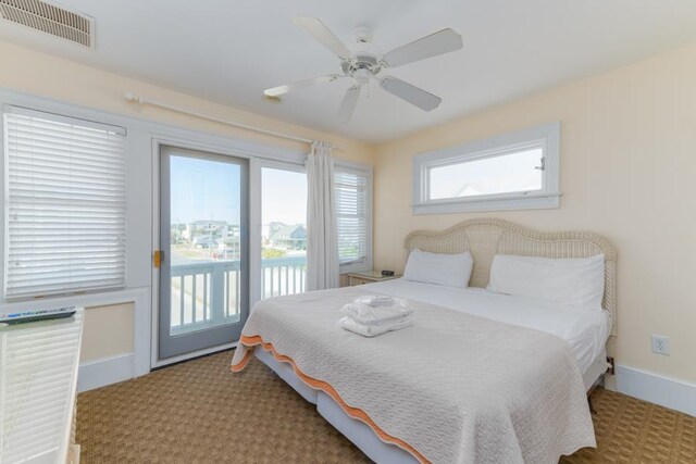 bedroom featuring light colored carpet, visible vents, ceiling fan, access to outside, and baseboards