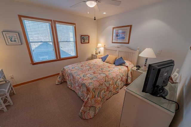 bedroom featuring a ceiling fan, baseboards, and carpet flooring