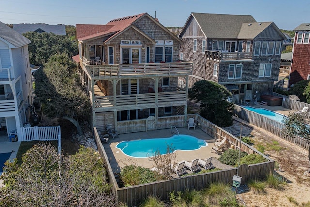 view of swimming pool featuring a fenced backyard