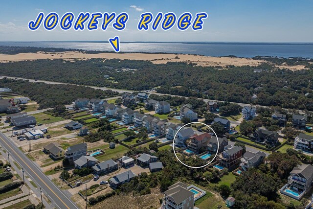 aerial view featuring a residential view and a water view