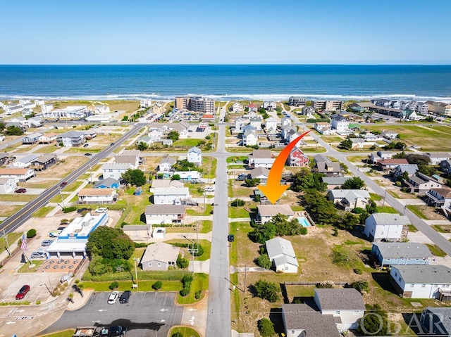 aerial view with a residential view and a water view